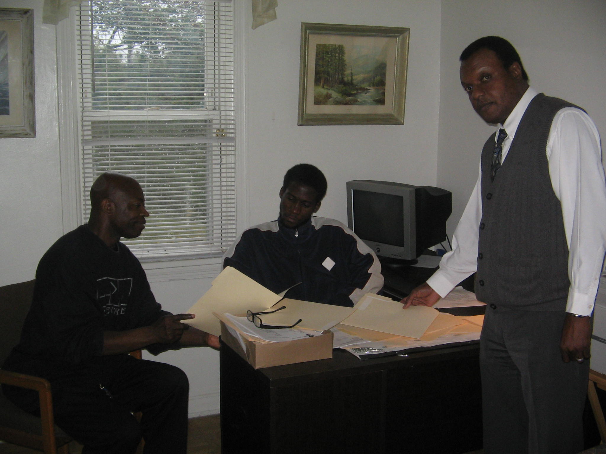 Outreach volunteers preparing supplies for a community assistance event