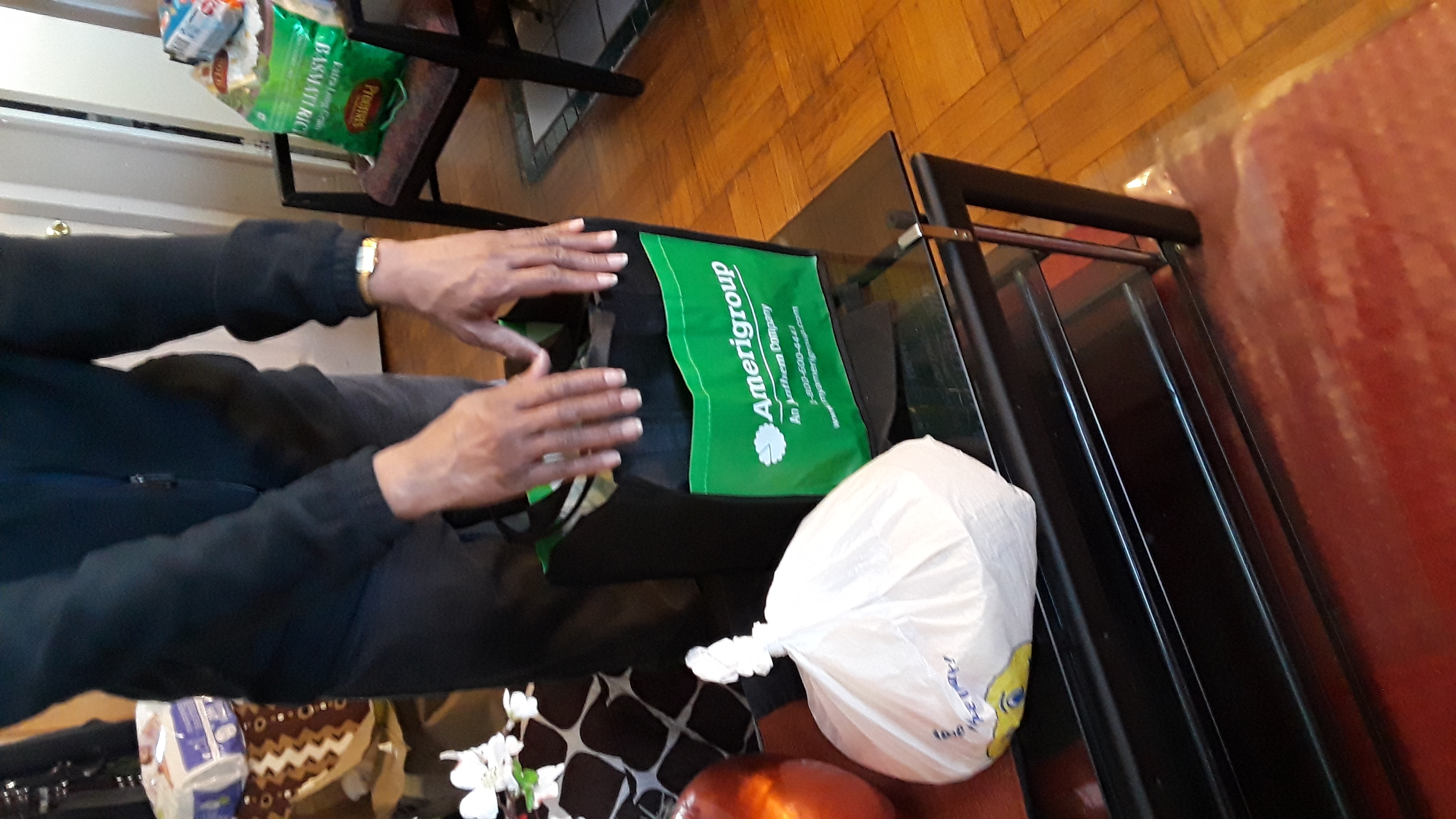 Volunteer team at a distribution table serving community members