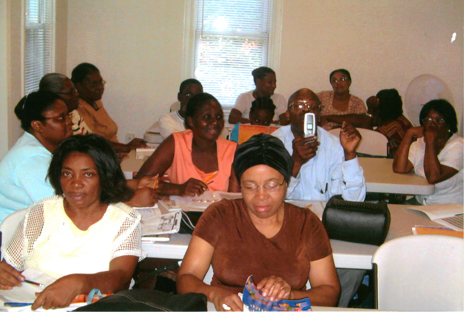 Support session with local families at a Caribbean Help Center outreach event