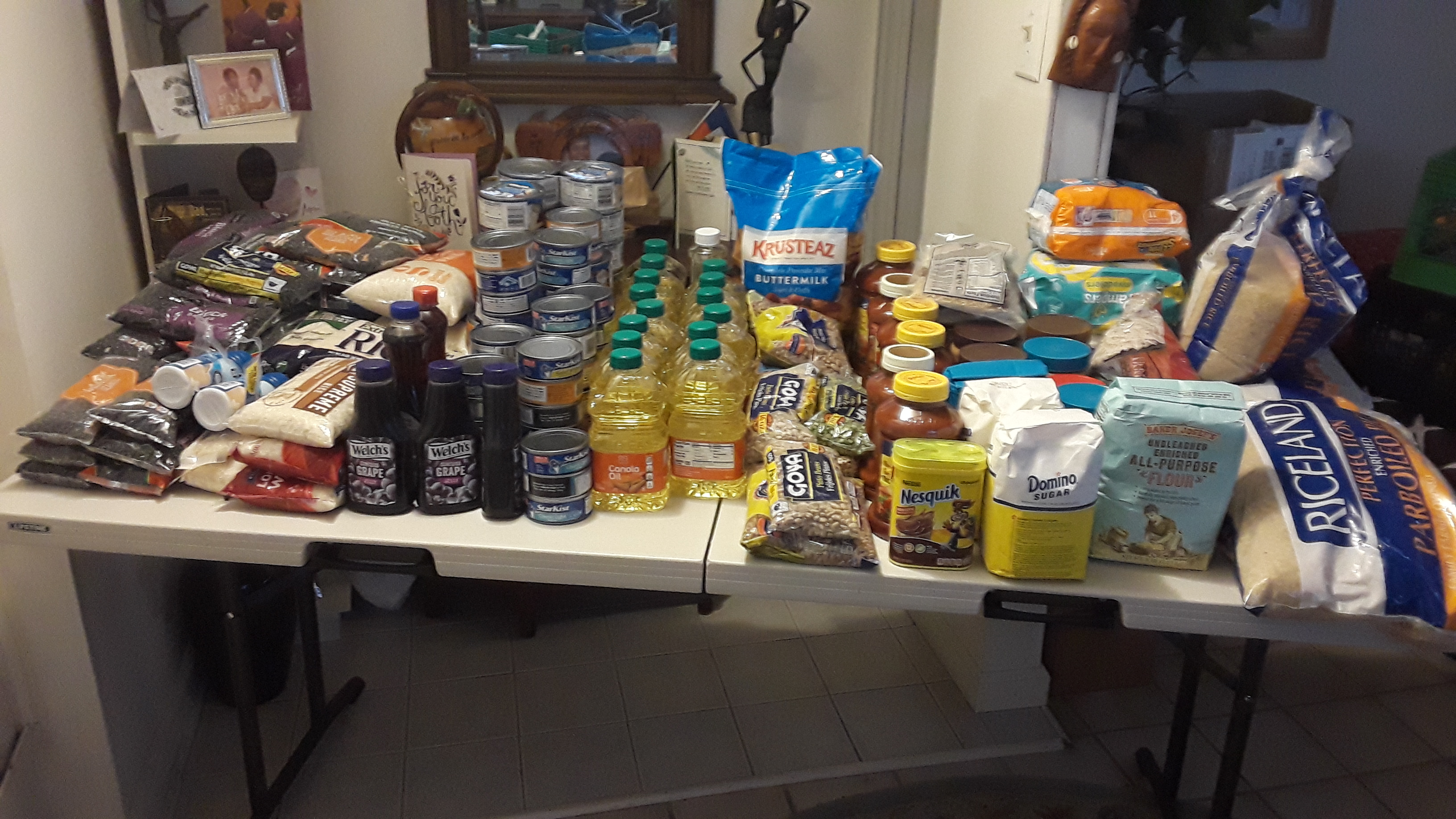 Support team preparing food and essentials for families