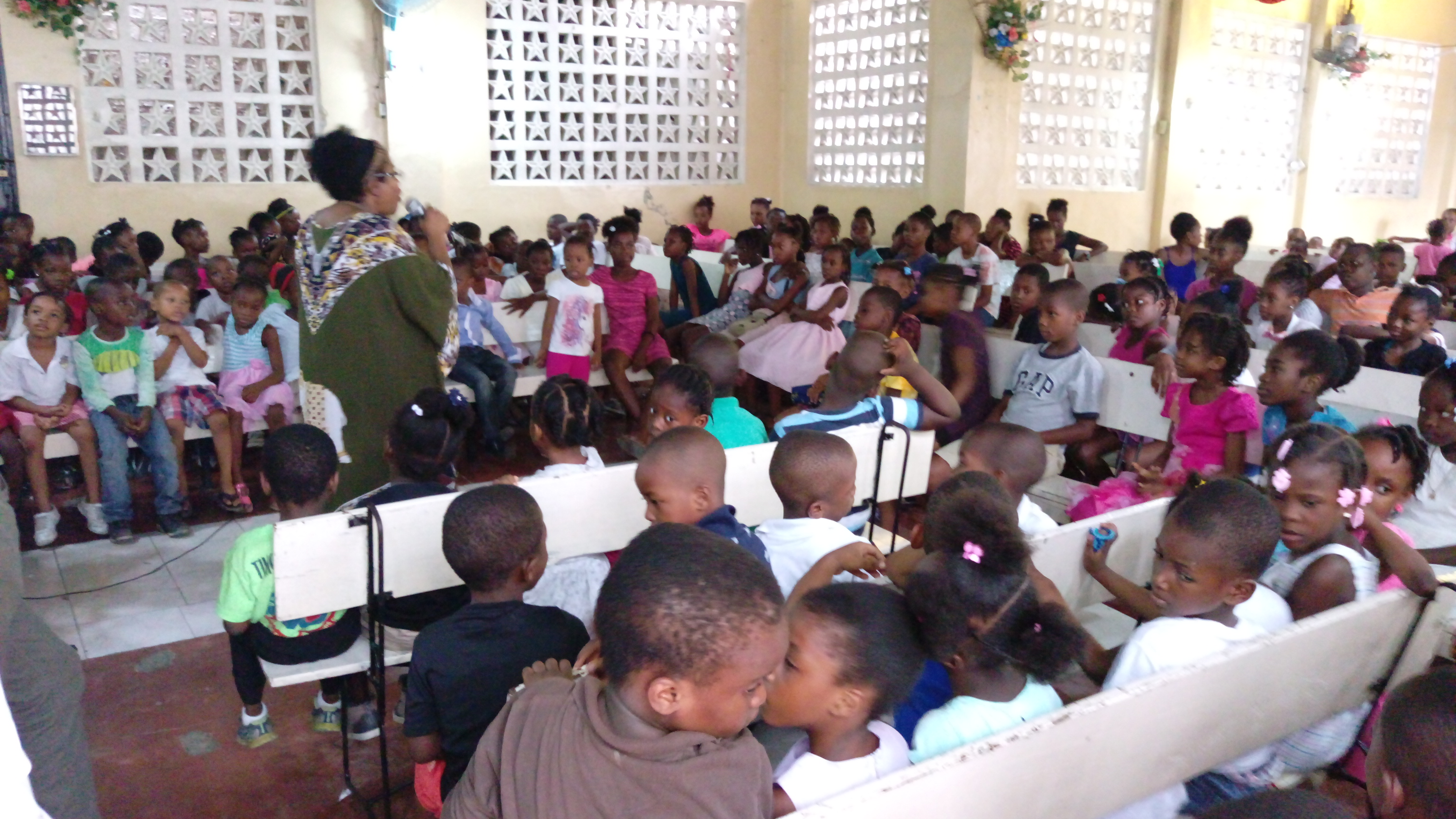 Community members receiving help at a local assistance event